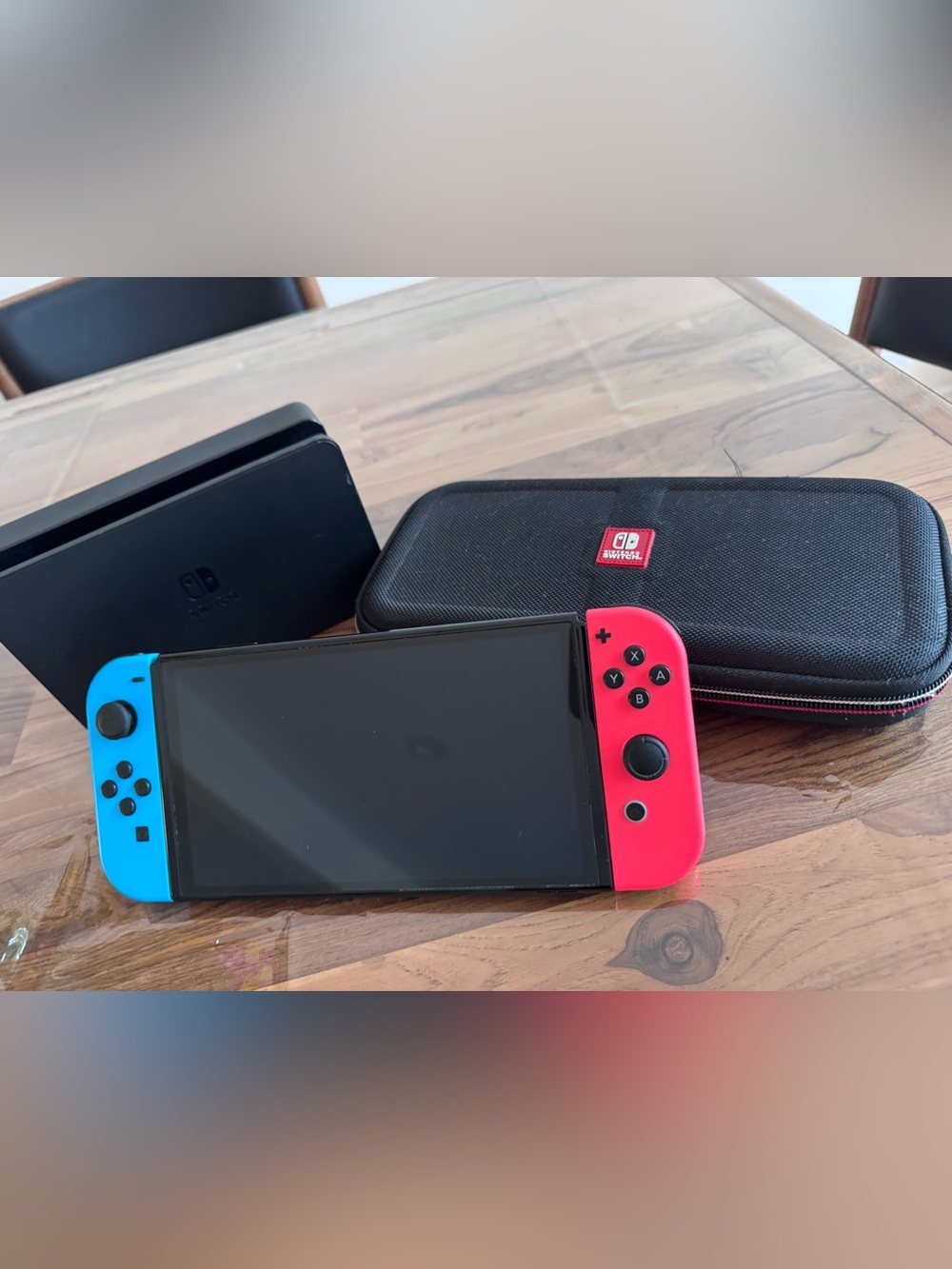Nintendo Switch OLED model with Black Carrying Case